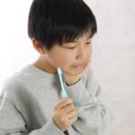 虫歯で歯が痛い子供